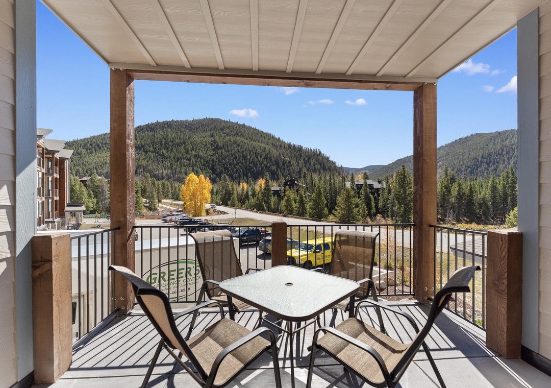 Enjoy breathtaking mountain views from your private covered balcony, perfect for morning coffee or sunset dining.