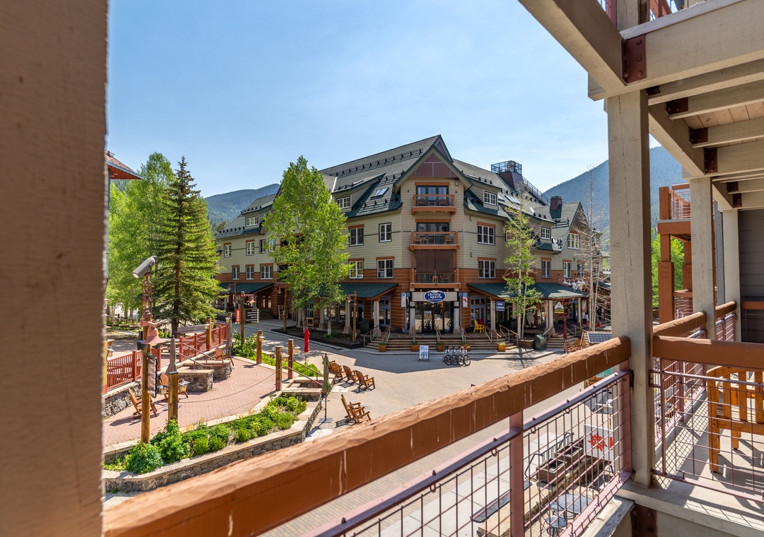 Step onto your private balcony and soak in the charming mountain village atmosphere below, where shops and cafés create a perfect alpine retreat.