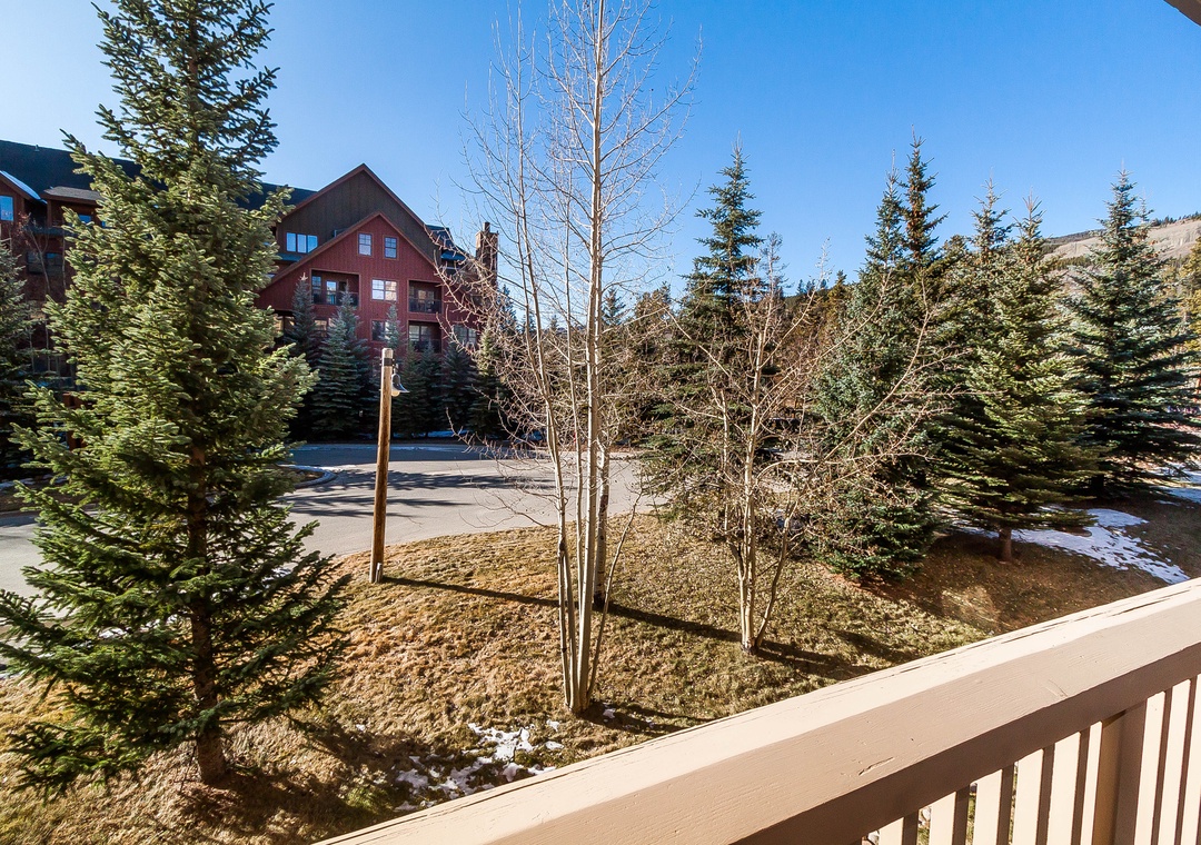 Step onto your private balcony and breathe in the crisp mountain air while enjoying peaceful views of evergreen trees and the surrounding alpine neighborhood.