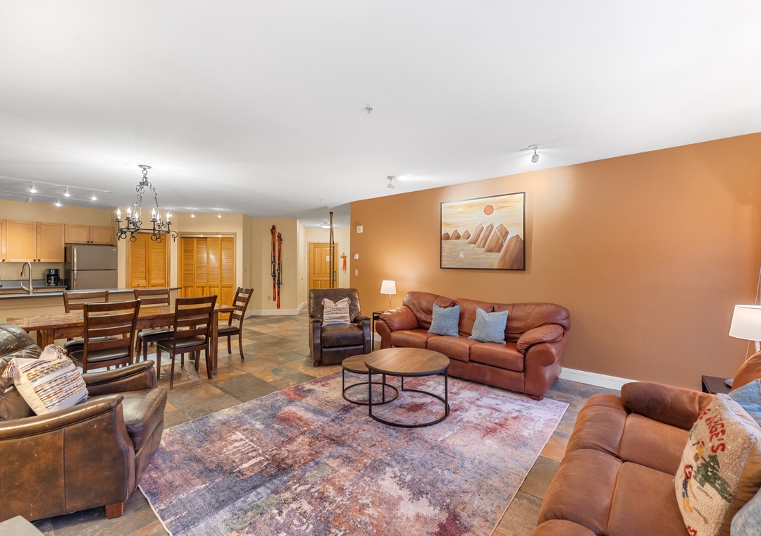 Sink into plush leather seating where warm earth tones and thoughtful touches create your perfect retreat for relaxation.