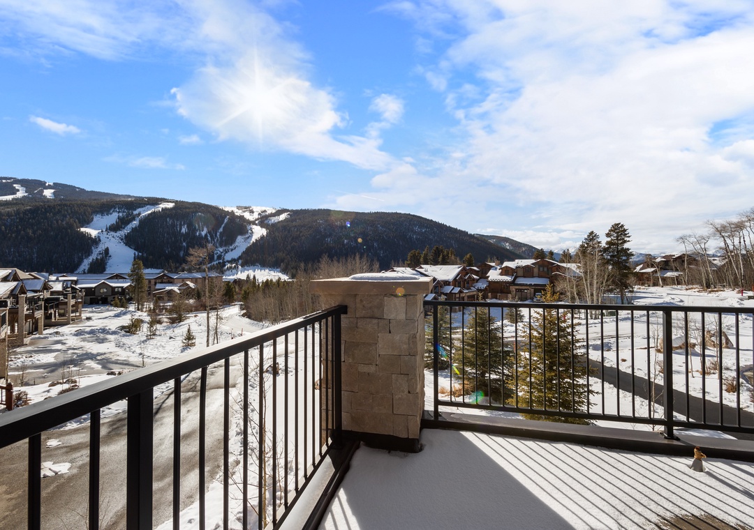 Breathtaking ski slopes and mountain views from your private balcony, where winter adventures await just steps away.