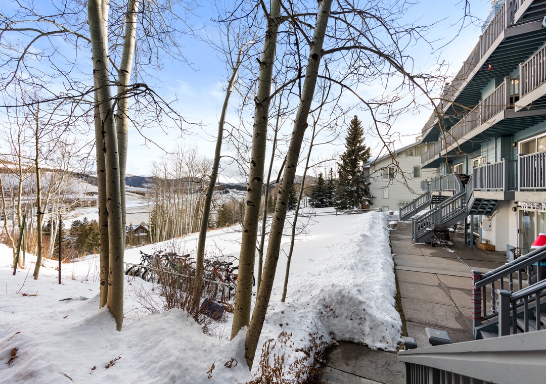 Snow-covered property building with mountain views and winter landscape surrounding the accommodation area.