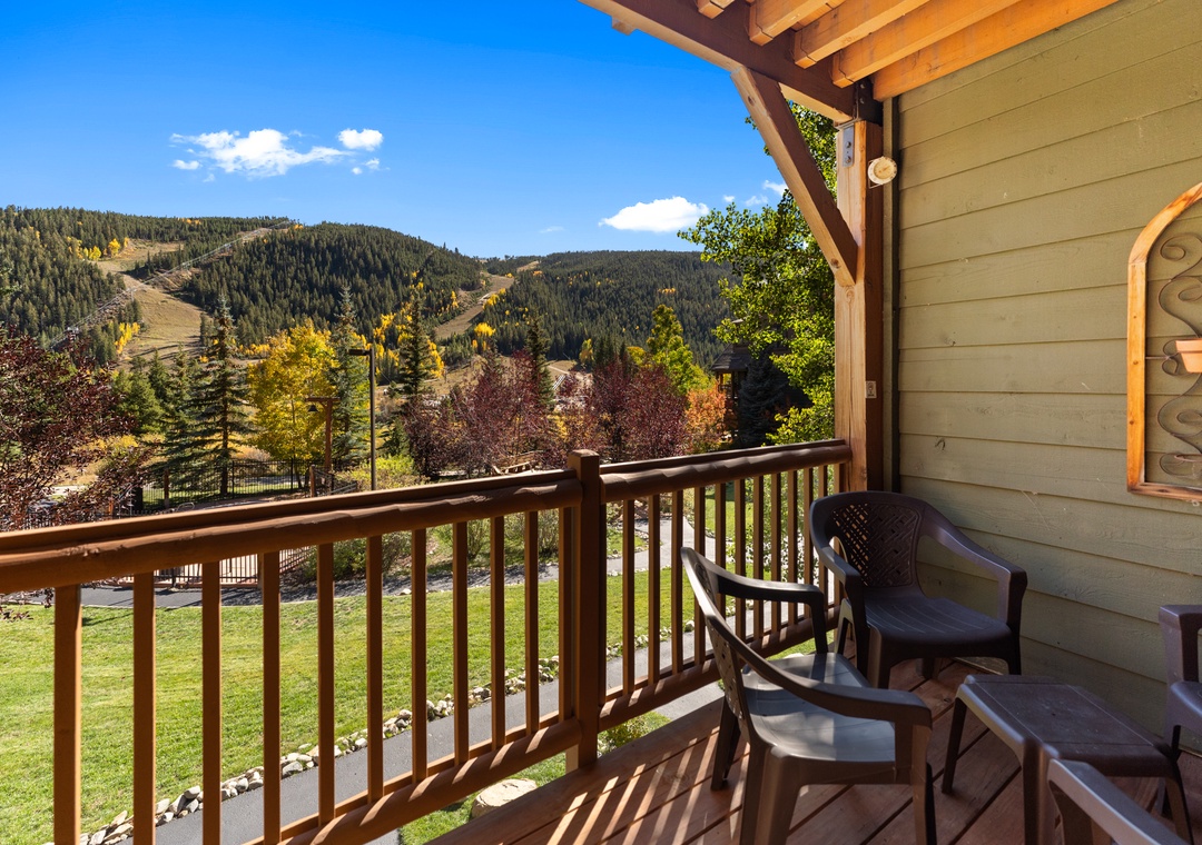 Unwind on your private balcony with stunning mountain views, where autumn colors paint the landscape and ski slopes beckon.