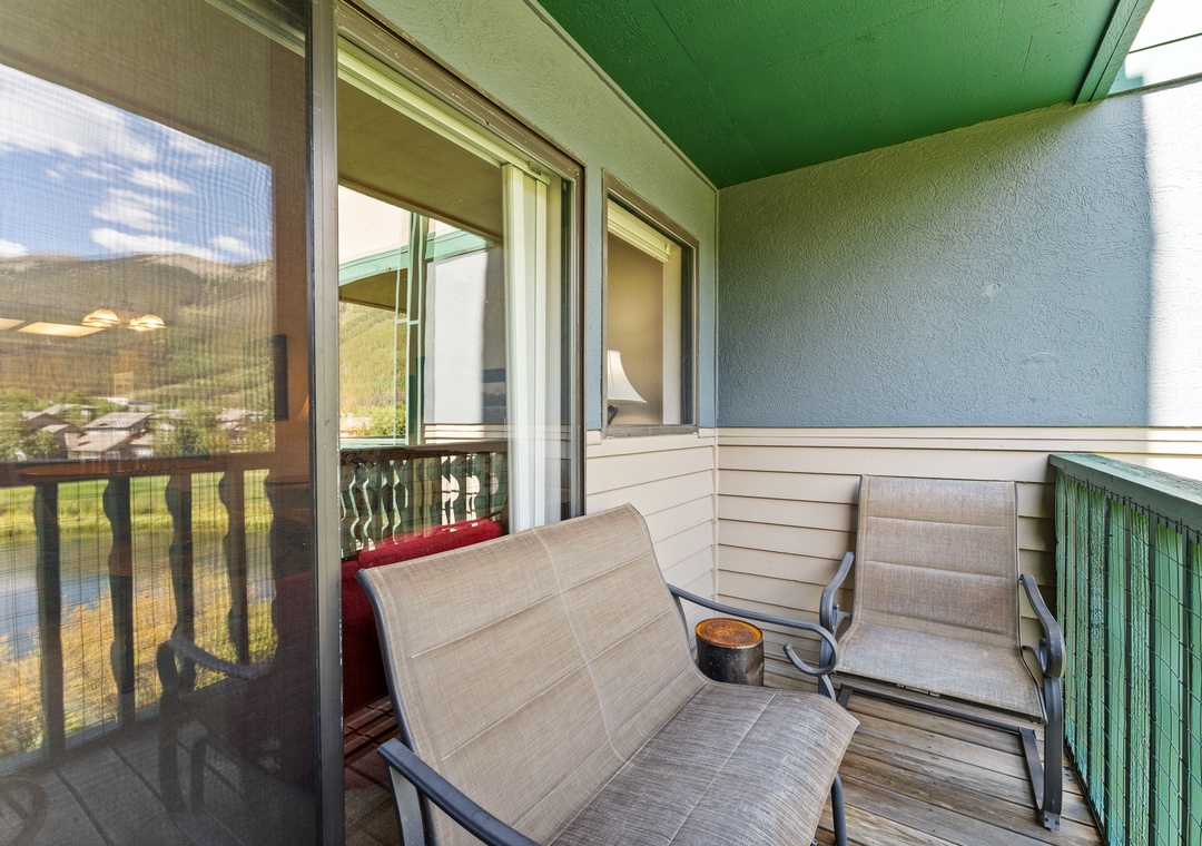 Unwind on your private balcony with comfortable seating and mountain views, perfect for morning coffee or evening relaxation.