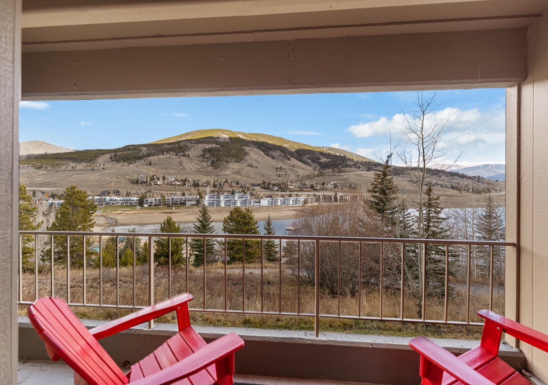 Sink into these bright red chairs on your private balcony and soak in breathtaking mountain views.
