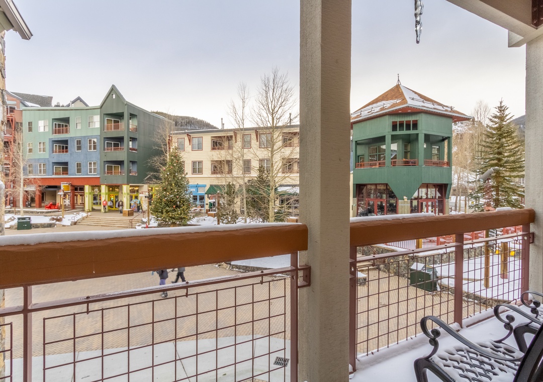 Cozy up on your private balcony with coffee in hand, watching the charming village come to life below.