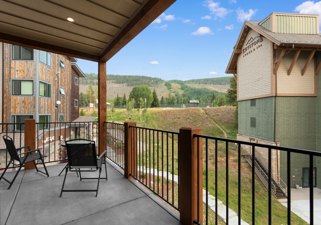 Step onto your private covered balcony and take in stunning mountain vistas stretching across a peaceful valley. Settle into comfortable seating and breathe in the fresh alpine air as you watch the changing light over forested slopes.