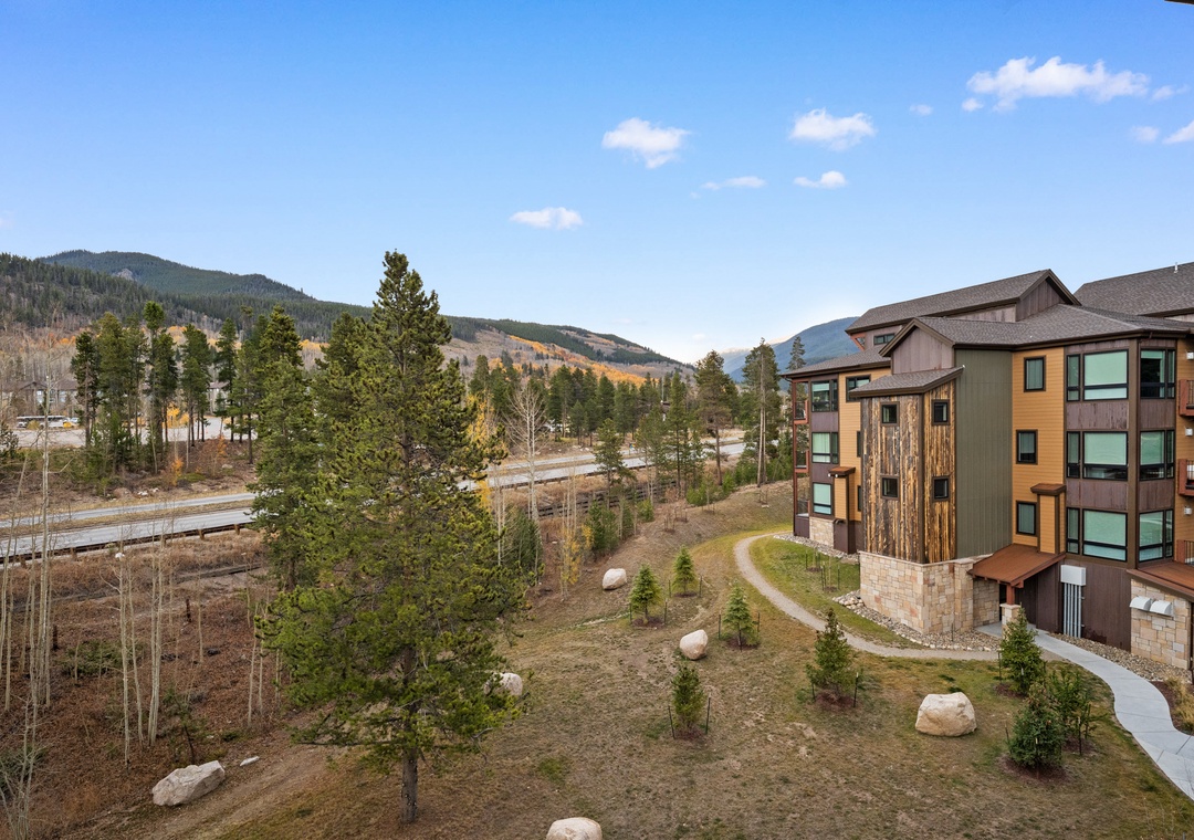Modern mountain retreat nestled among autumn aspens with stunning alpine views and peaceful forest surroundings.