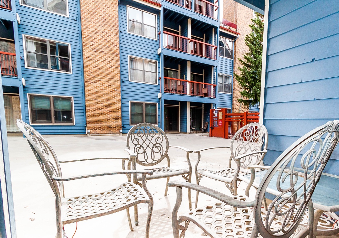 Step onto your private patio and settle into elegant outdoor dining furniture, perfect for morning coffee or evening conversations.