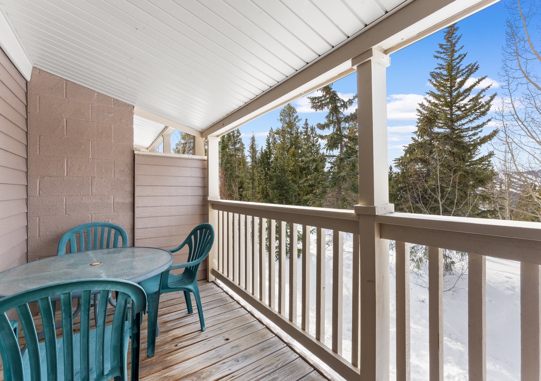 Step onto your private covered balcony where morning coffee tastes better with snowy forest views and fresh mountain air.