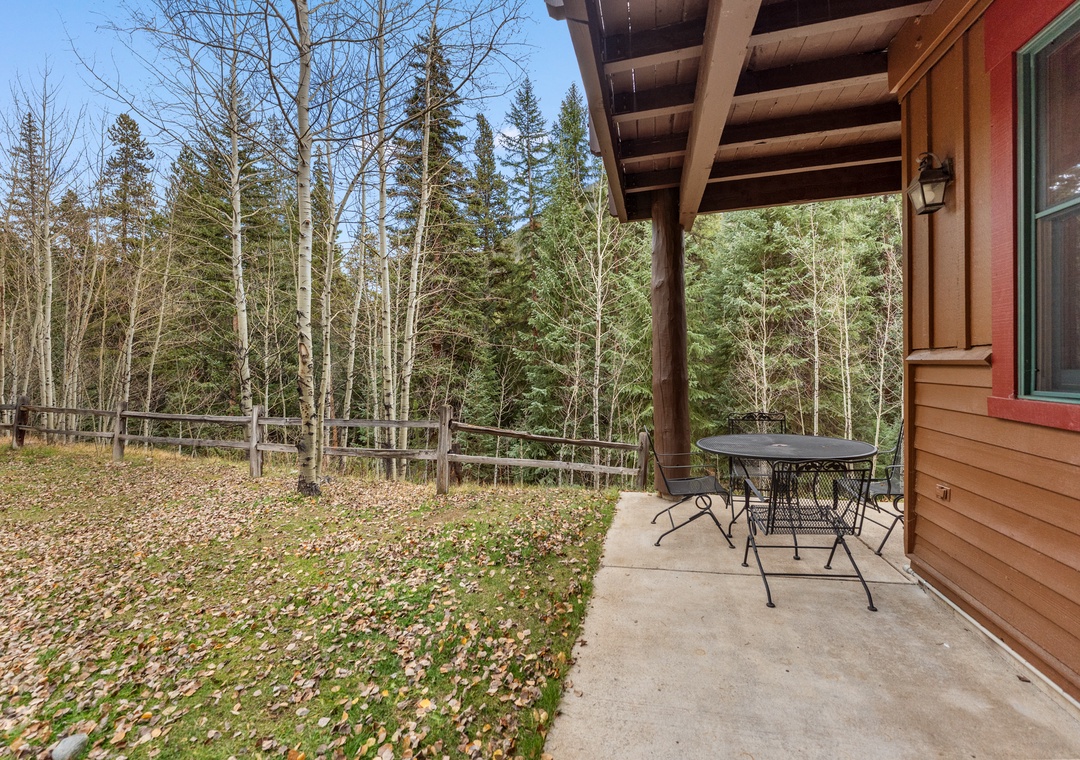 Relax on your private patio with forest views, where morning coffee tastes better surrounded by towering pines and peaceful nature.