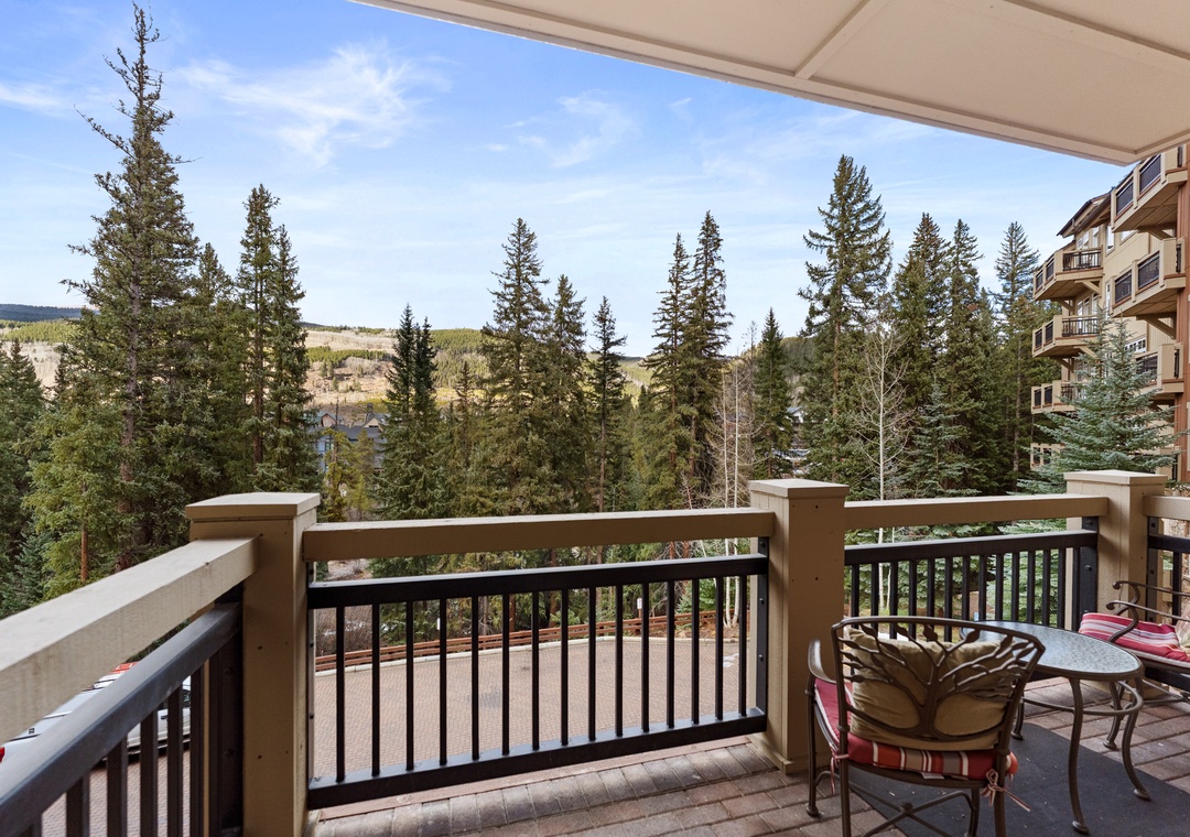 Step onto your private balcony and breathe in the fresh mountain air while enjoying stunning forest views.