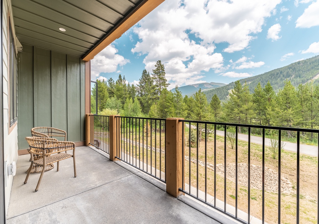 Step onto your private balcony and breathe in the crisp mountain air while soaking up panoramic forest views.