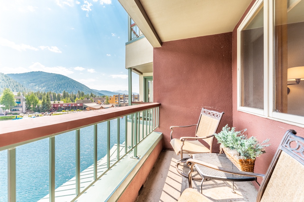 Step onto your private balcony and soak in breathtaking mountain and water views while enjoying morning coffee in your comfortable outdoor seating.
