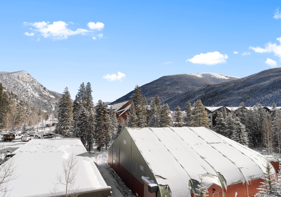 Nestled in a pristine mountain valley, the property offers serene winter surroundings with snow-dusted peaks and evergreen forests forming a breathtaking backdrop to the alpine neighborhood.