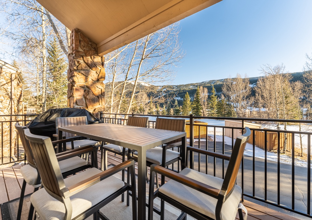 Enjoy winter mountain views from your private balcony, complete with dining table and BBQ for memorable outdoor meals.