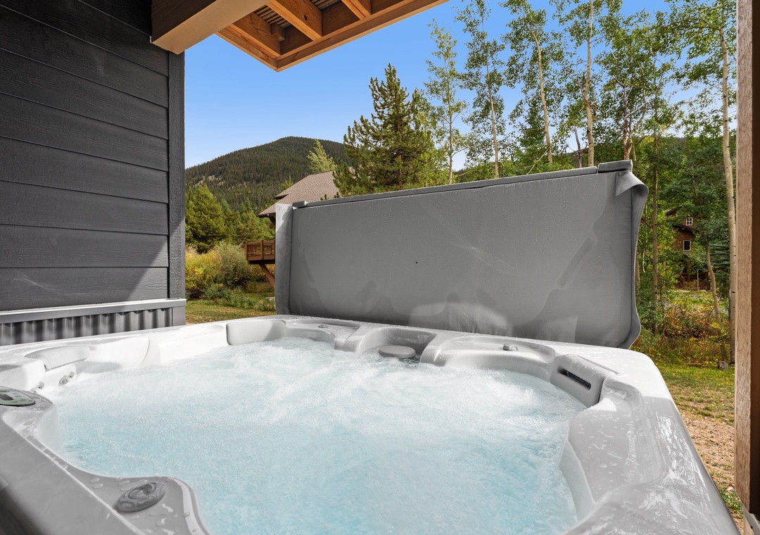 Soak in your private hot tub while surrounded by fresh mountain air and peaceful forest views—your perfect escape after a day of adventure.