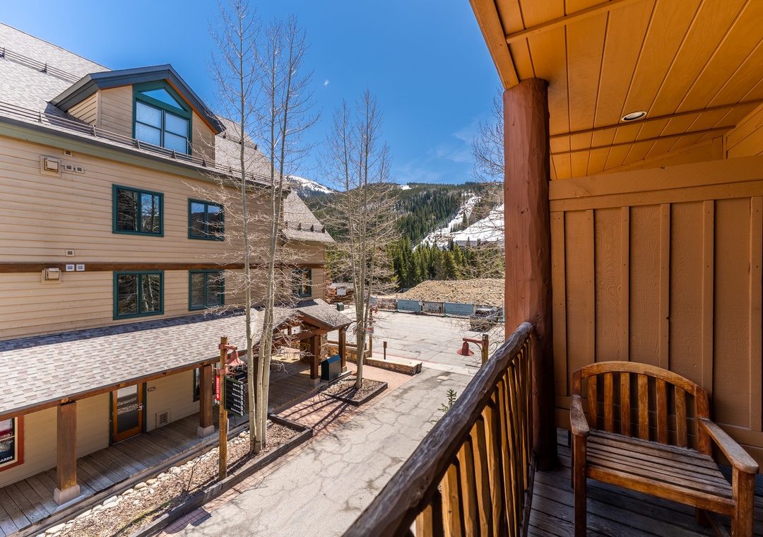 Relax on your private wooden balcony while taking in stunning mountain views and fresh alpine air.