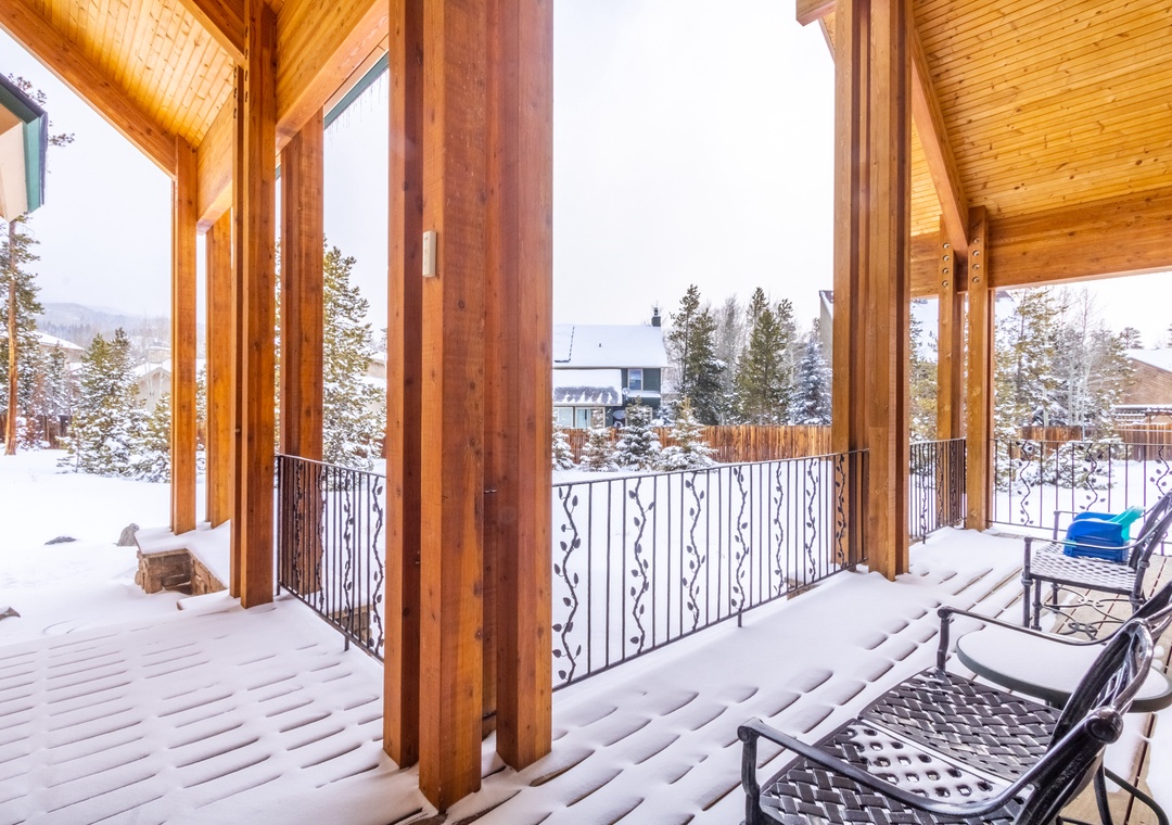 Step onto your private covered deck where winter mountain views frame your morning coffee moments in cozy alpine comfort.