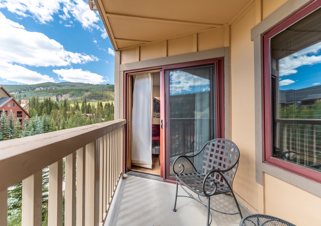 Step onto your private balcony and sink into the cozy chair while soaking in breathtaking mountain views.