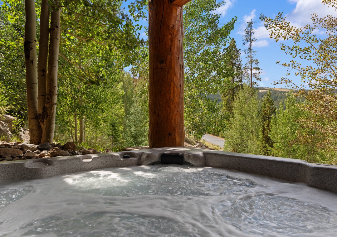 Sink into your private hot tub and let the warm, bubbling water soothe your muscles as you gaze out at aspen groves and mountain scenery—pure alpine bliss awaits.