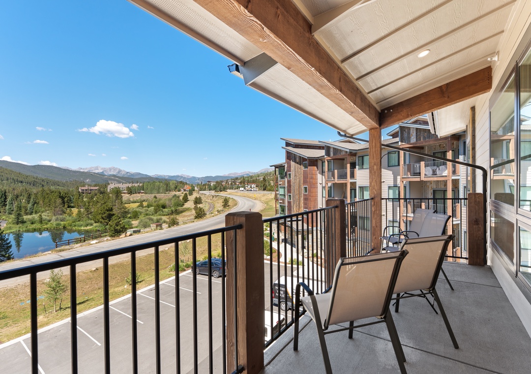 Mountain peaks and forested hillsides stretch out before you from your private terrace, with a peaceful pond and open space just below. Relax in comfortable seating and soak in the views.