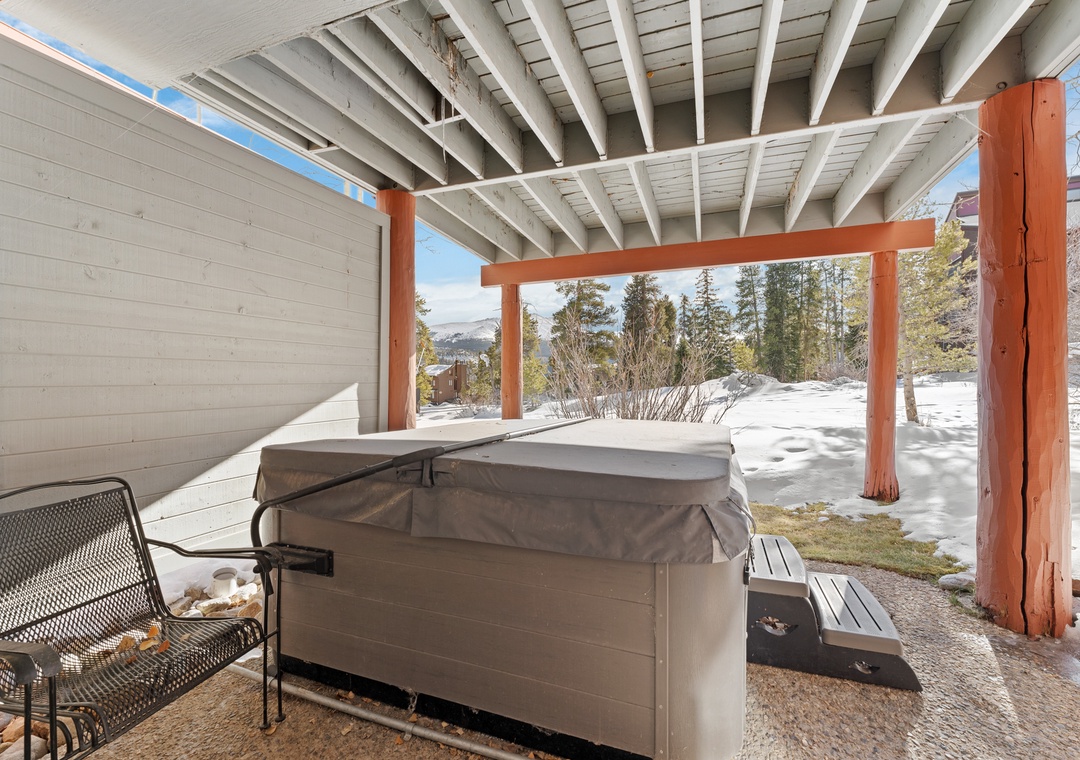 Relax in your private hot tub on the covered patio, soaking away stress while gazing at snowy mountain views.