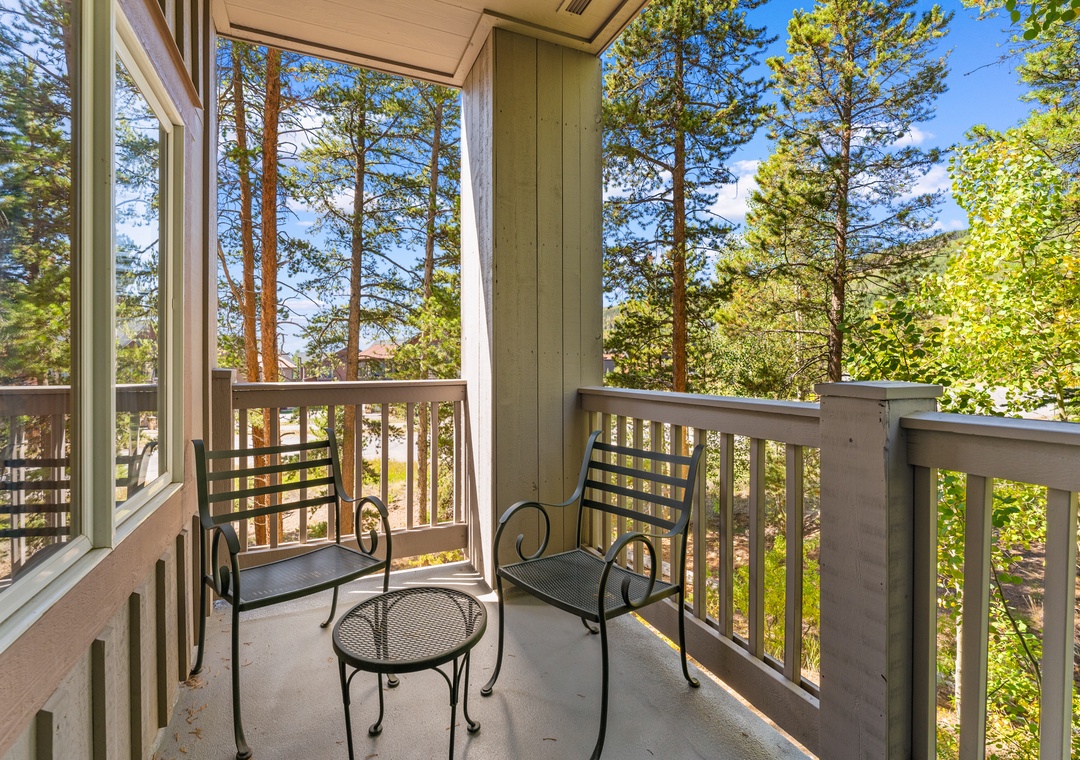 Unwind on your private balcony with forest views, where morning coffee and evening relaxation feel perfectly at home among the trees.