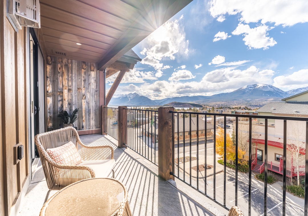 Settle into your private balcony chair and soak in breathtaking mountain views that stretch across the valley.