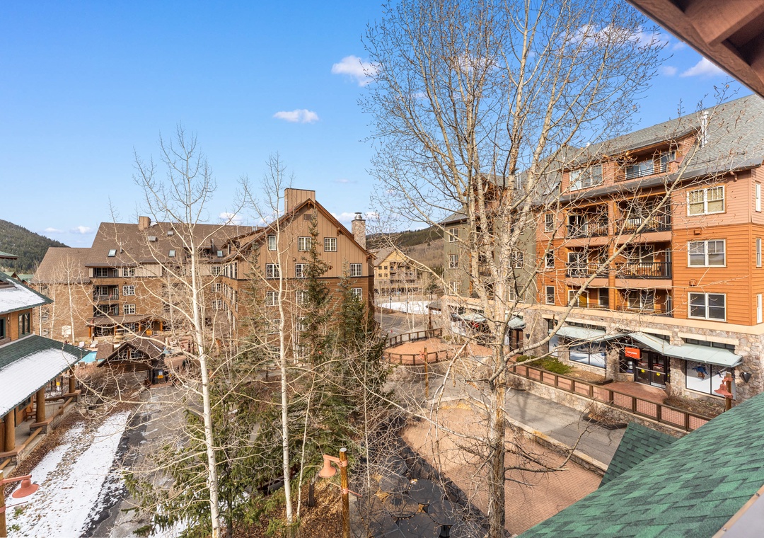 Charming mountain village setting with alpine architecture and scenic surroundings visible from the property area.
