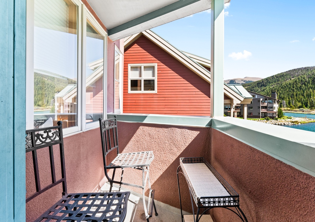 Relax on your private balcony with mountain views and charming village scenery for your perfect alpine getaway.