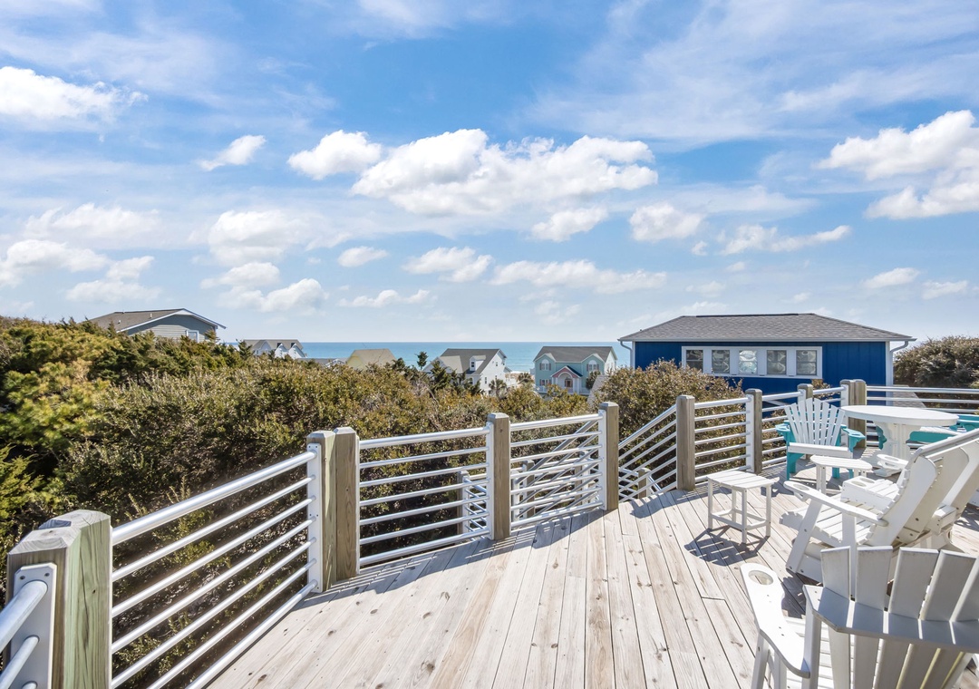 Relax on your private deck with stunning ocean views, where morning coffee and evening sunsets become daily rituals in this peaceful coastal retreat.