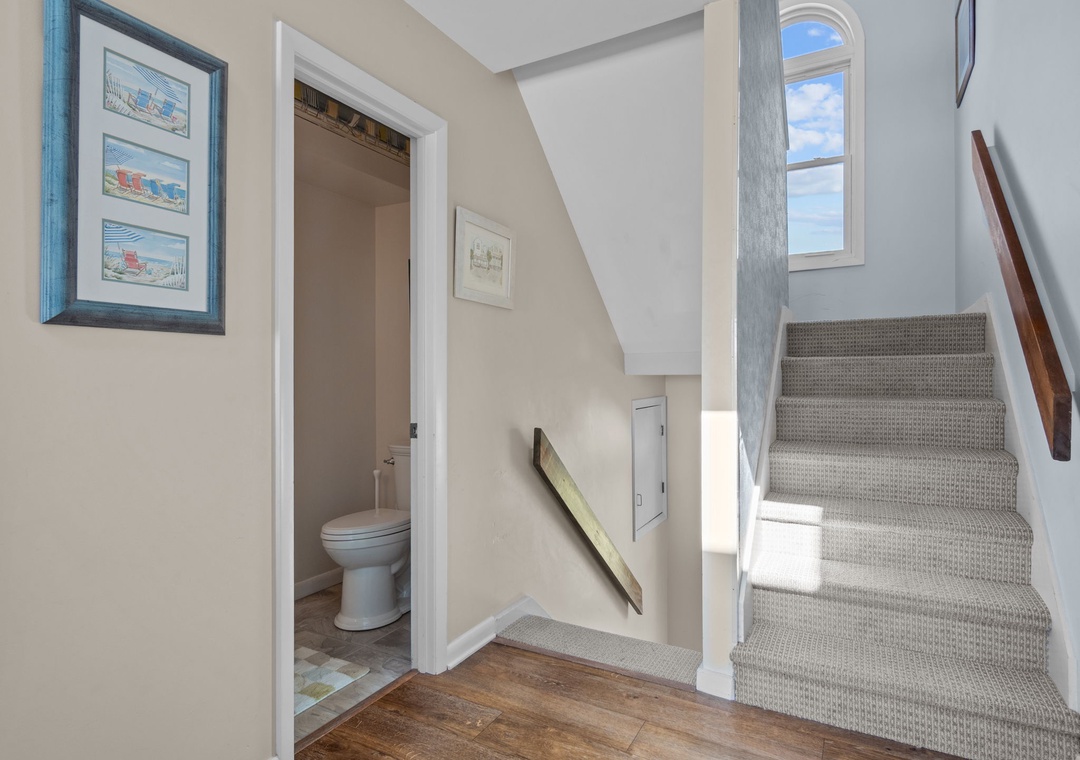 Stairs down to carport or up to the King Suite Loft