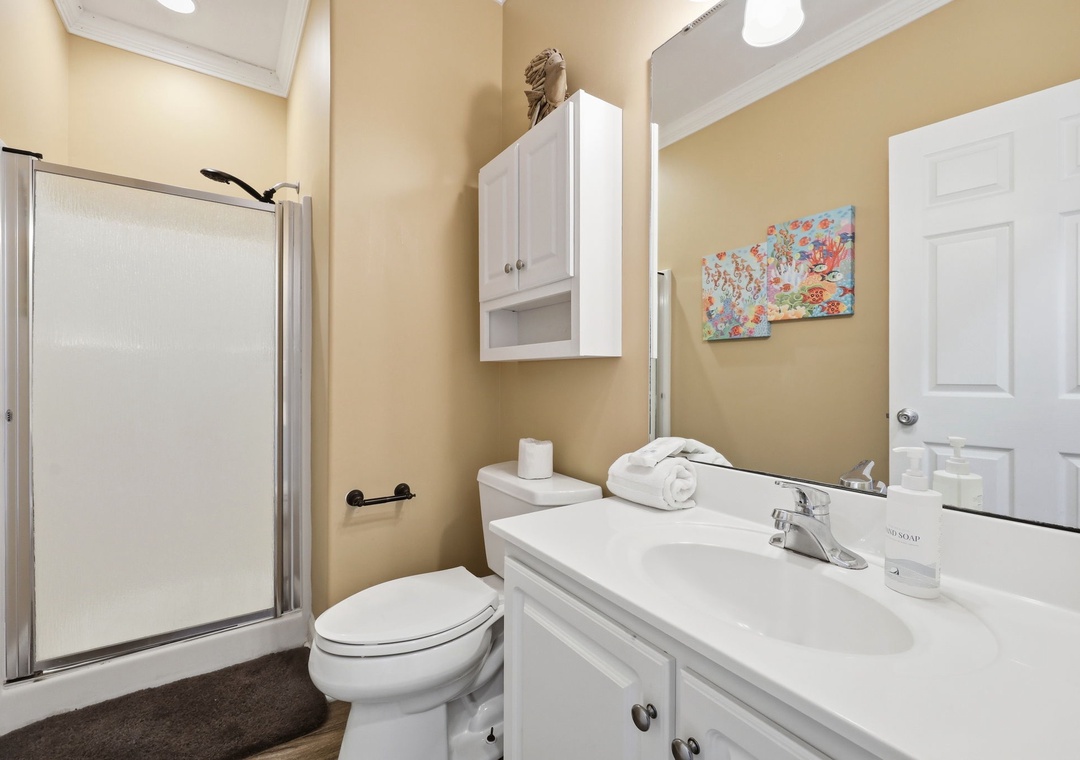 Your private bathroom features fresh linens and everything you need to feel at home—bright, clean, and thoughtfully stocked for a comfortable stay.