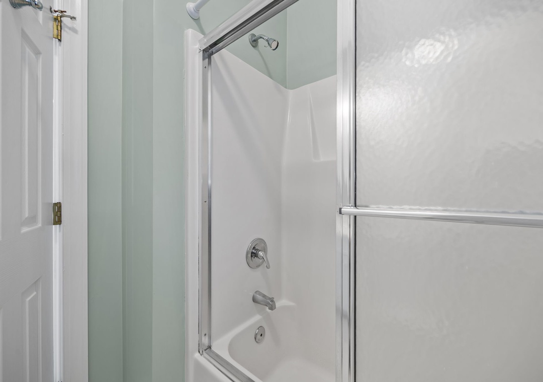 Step into your private retreat with a sparkling clean shower-tub combo, perfect for unwinding after your adventures.