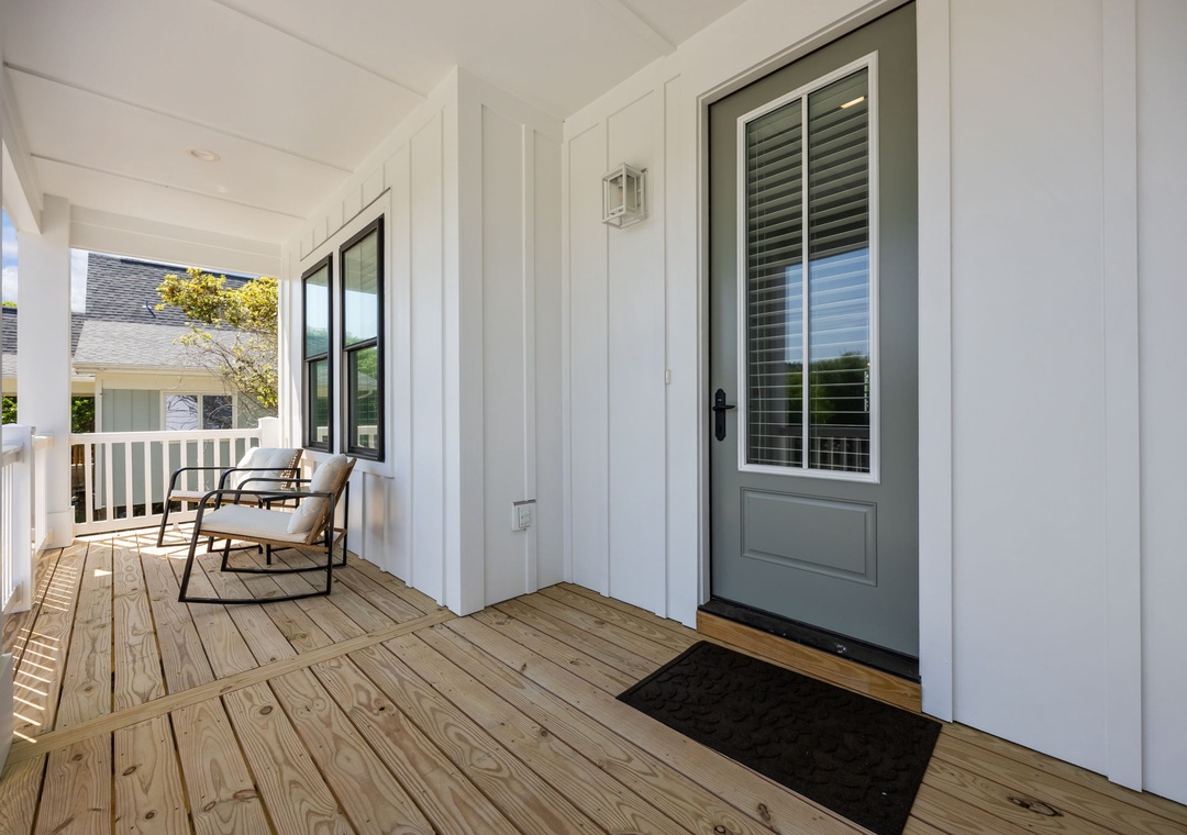 Step onto your private covered porch and sink into the cozy chair where you can unwind with morning coffee or evening relaxation.