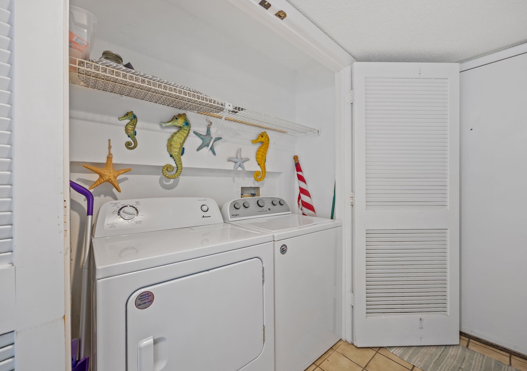 Your private laundry space makes beach trips worry-free with whimsical seahorse decor brightening wash day.