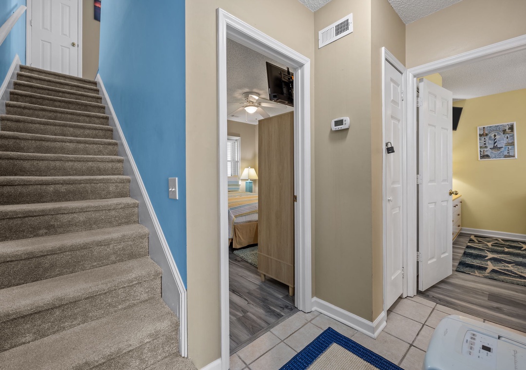 Step into your welcoming entryway where thoughtful touches and open sightlines create an inviting sense of home from the moment you arrive.