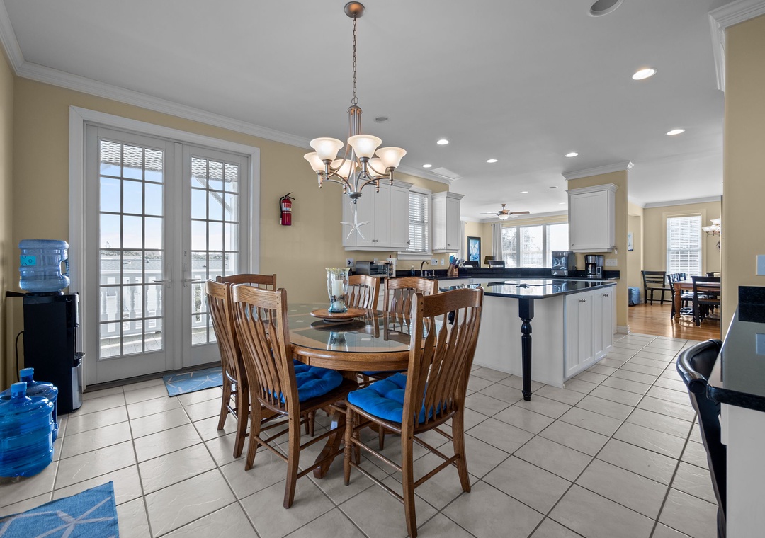 Your open-concept kitchen and dining space features modern appliances and a welcoming table where you can enjoy meals together.