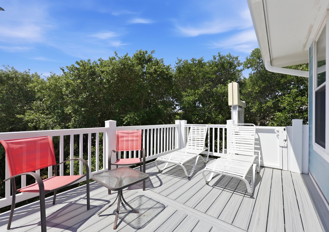 Picture yourself lounging in these comfy chairs, sipping your morning coffee while breathing in the fresh air and taking in lush treetop views from your private deck.