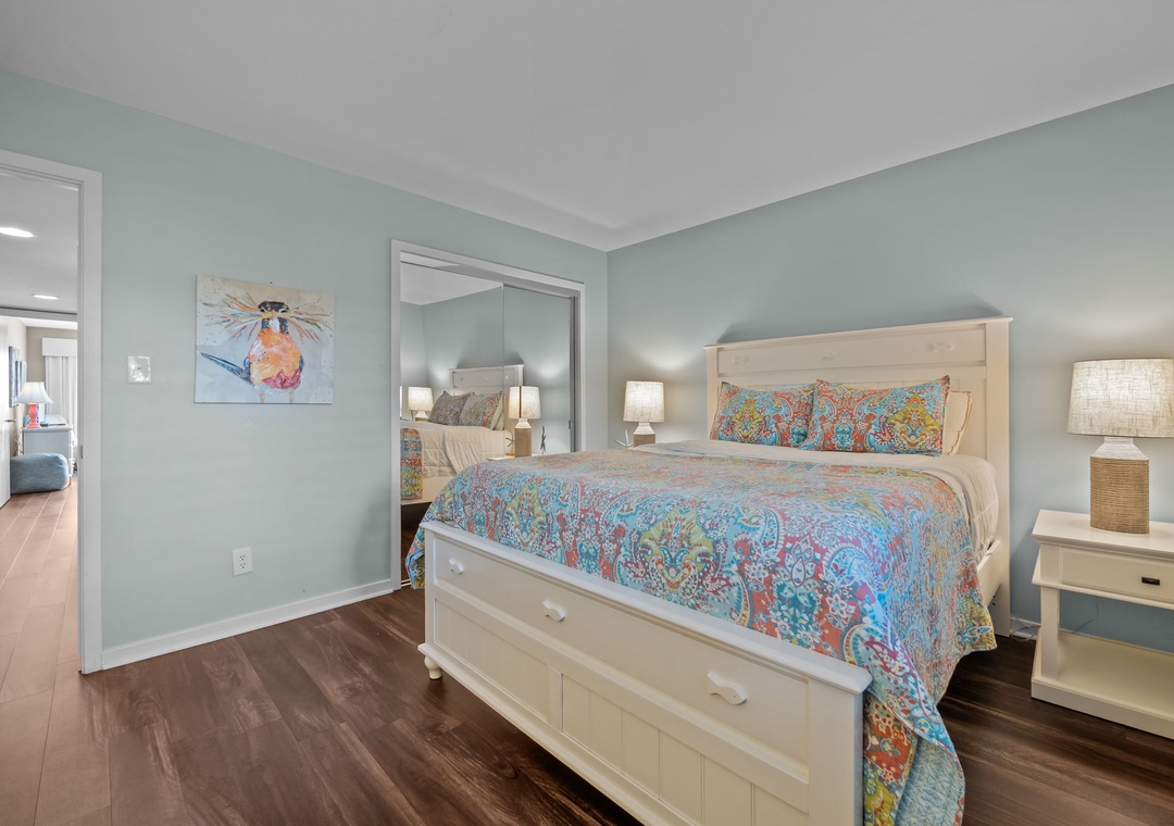 Sink into your comfortable bed surrounded by calming coastal colors and tropical artwork that sets the perfect beach vacation mood.