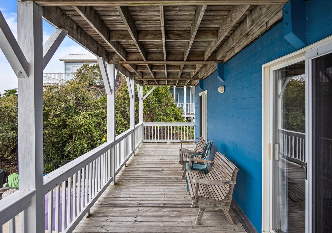 Settle into your covered deck with morning coffee, watching the world wake up through the trees.