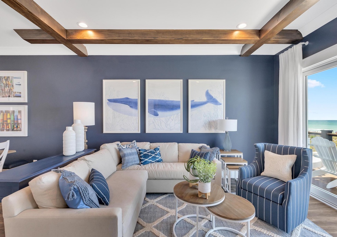 Sink into plush seating under coastal-inspired art and exposed beams, with refreshing ocean breezes just beyond your window.