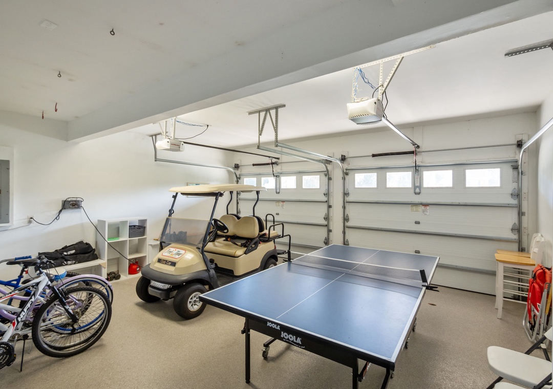 Garage with Golf Cart and Ping Pong Table