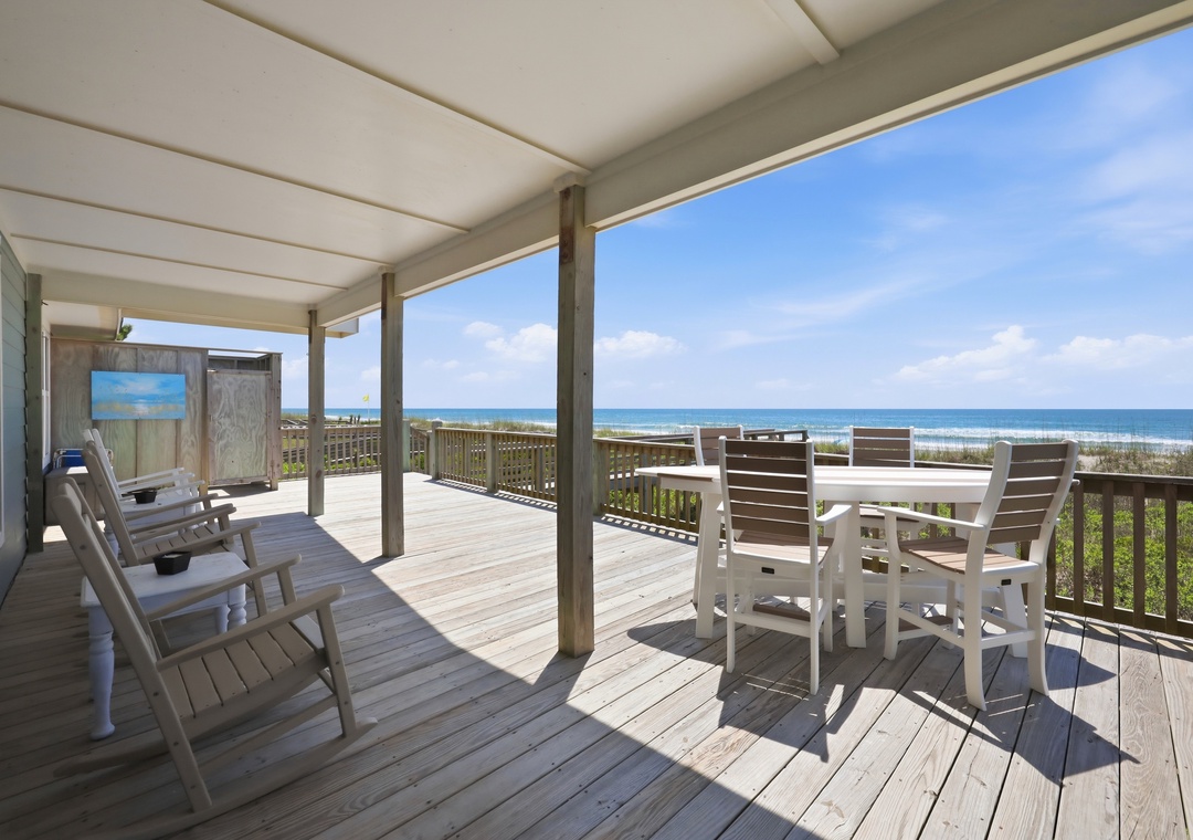 Your private oceanfront deck awaits, where gentle sea breezes and endless blue horizons create the perfect backdrop for morning coffee or sunset gatherings with loved ones.