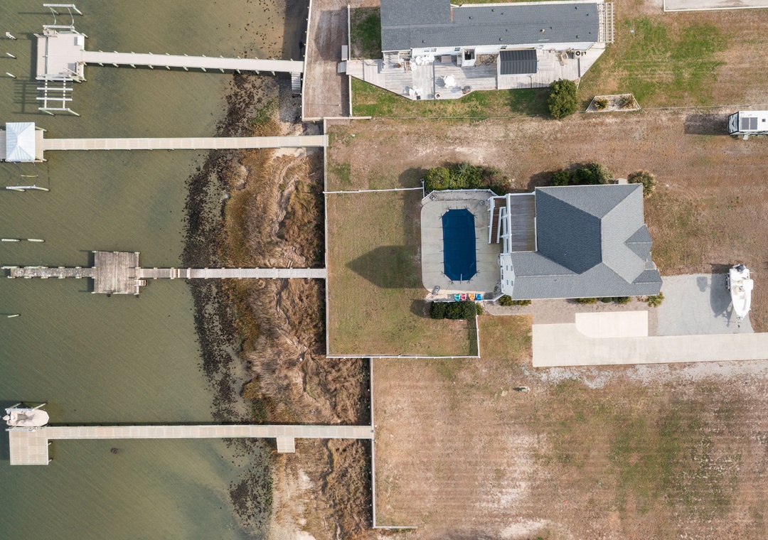 Waterfront property with private pool and dock access, perfectly positioned for coastal adventures.