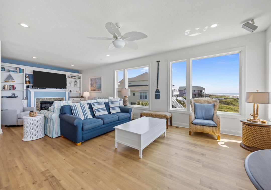 Relax in your bright coastal living room with ocean views, cozy seating, and all the comforts of home.