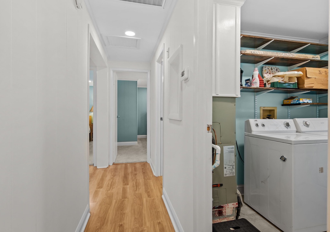 Your own washer and dryer make packing light a breeze, with convenient shelving for all your travel essentials.