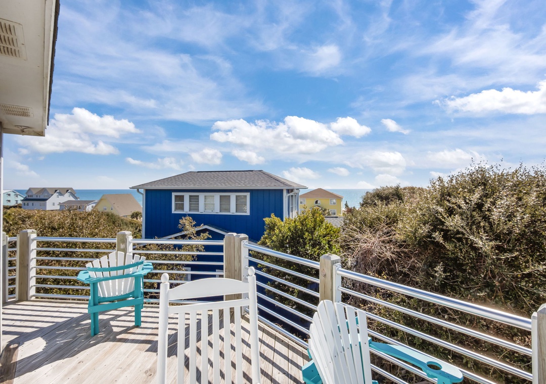 Relax in your private Adirondack chairs while soaking up ocean breezes and coastal views from this peaceful deck.