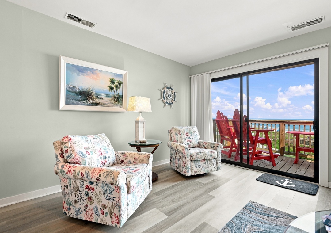 Char’s Cozy Condo | Living Area and Balcony Access